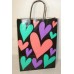 BOLSA DE CARTON PARA REGALO ESTAMPADA 22 X 30 PLC CORAZONES/BARRAS/TROPICAL/CHES